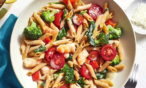 Penne Primavera prepared with fresh vegetables